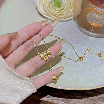 Bow Pendant With Heart Drop Necklace