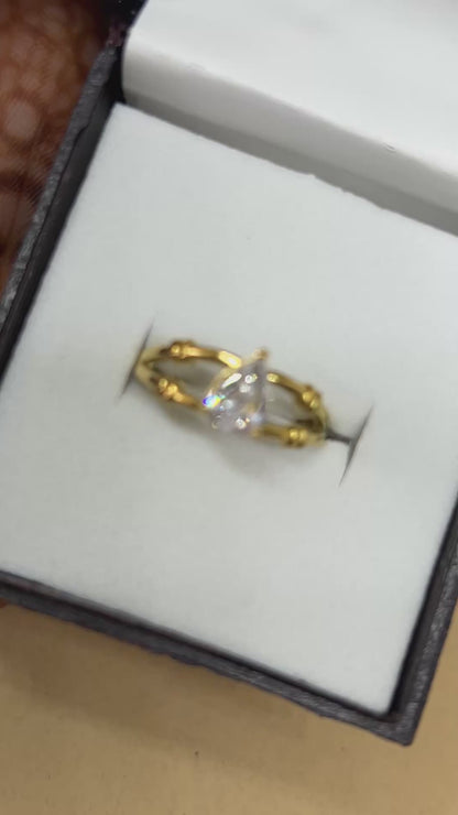 Golden Bamboo Pear-Cut Solitaire Ring